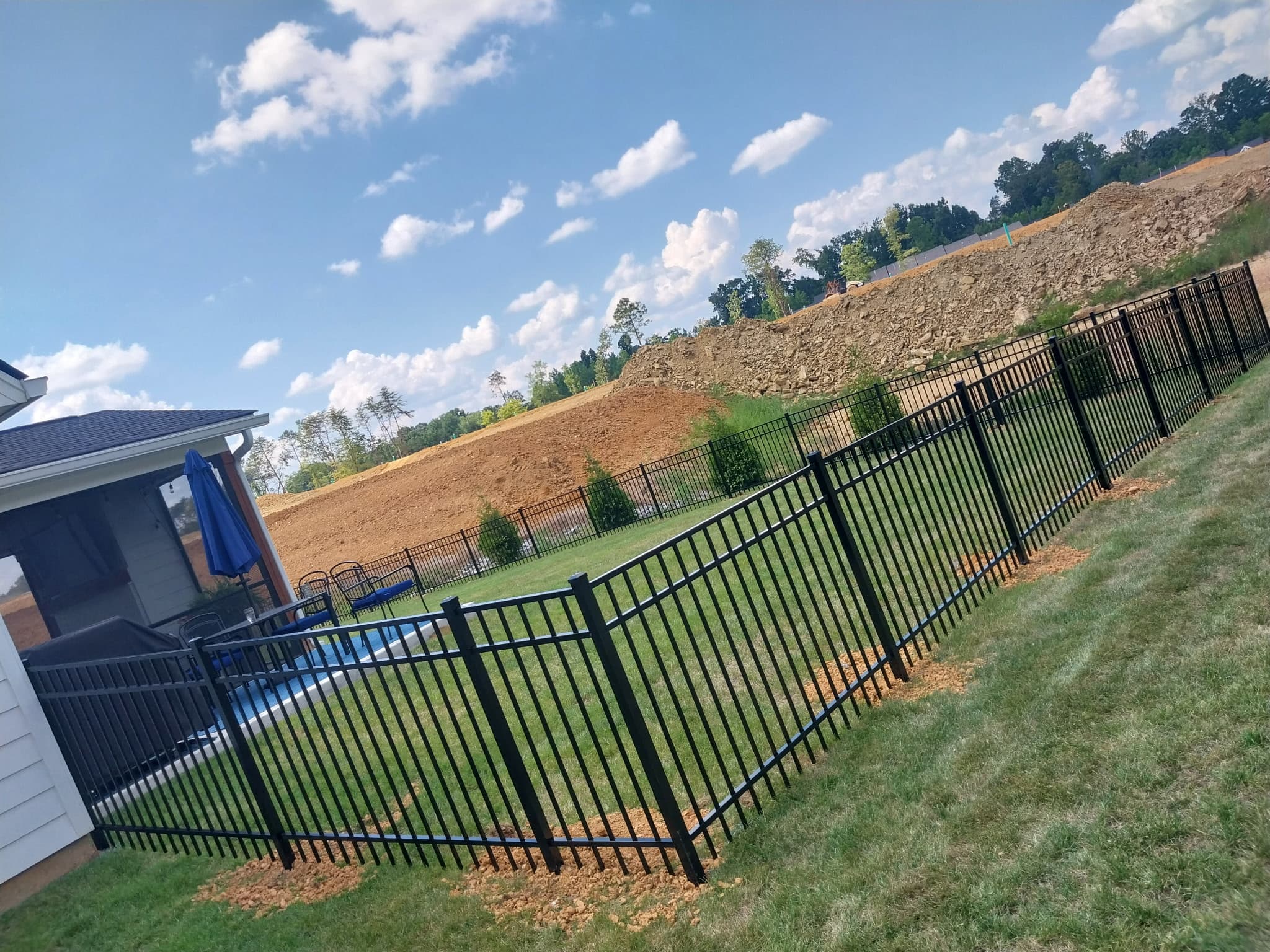 Pool-compliant aluminum fence with elegant design