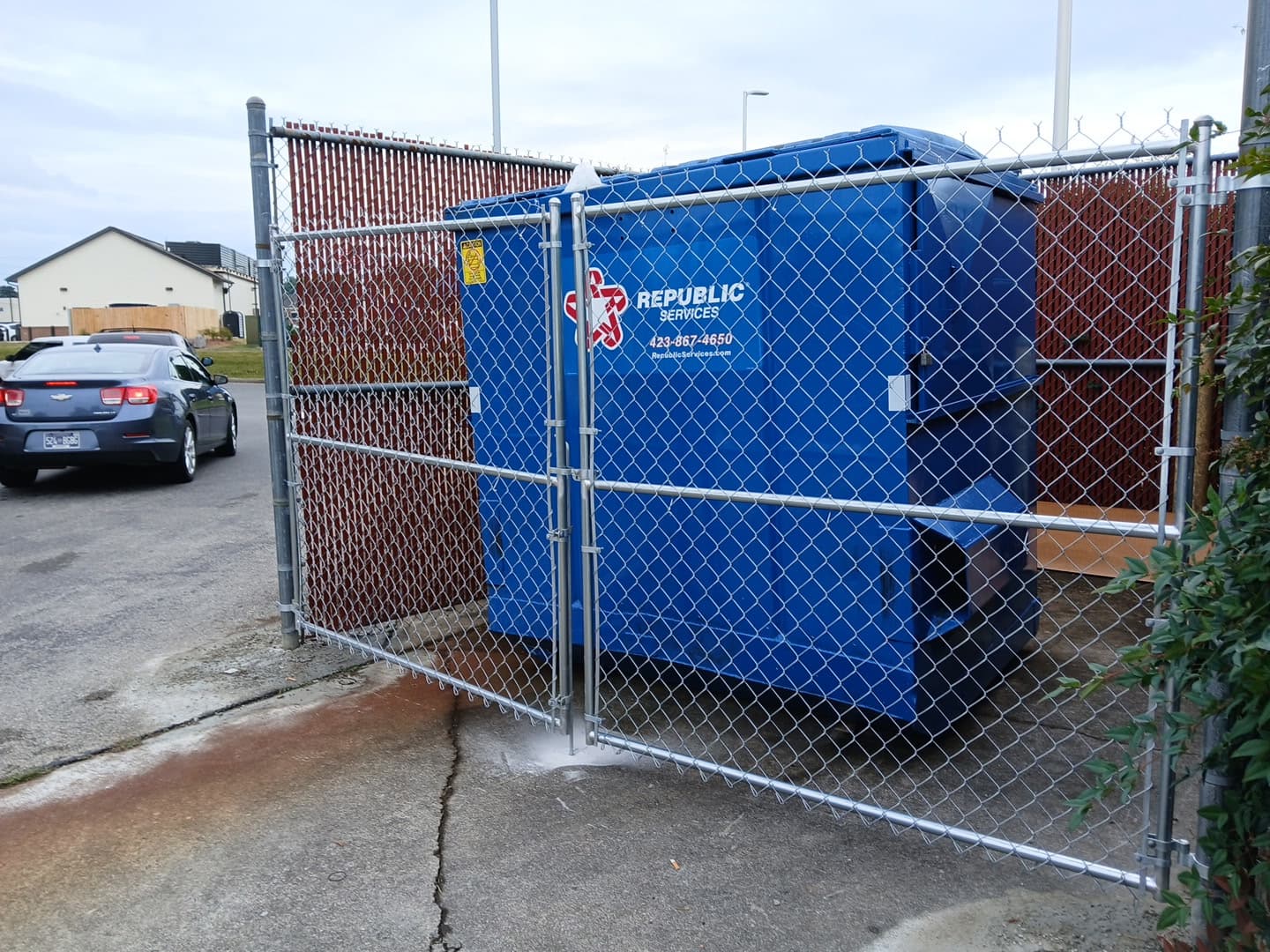 Chain-link security fence with gate