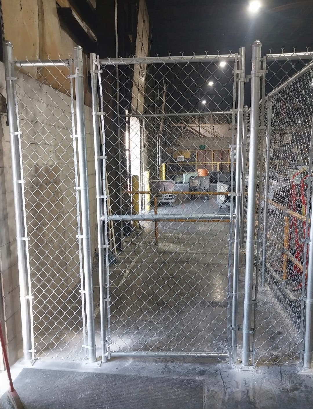 Commercial chain link swing gate installation