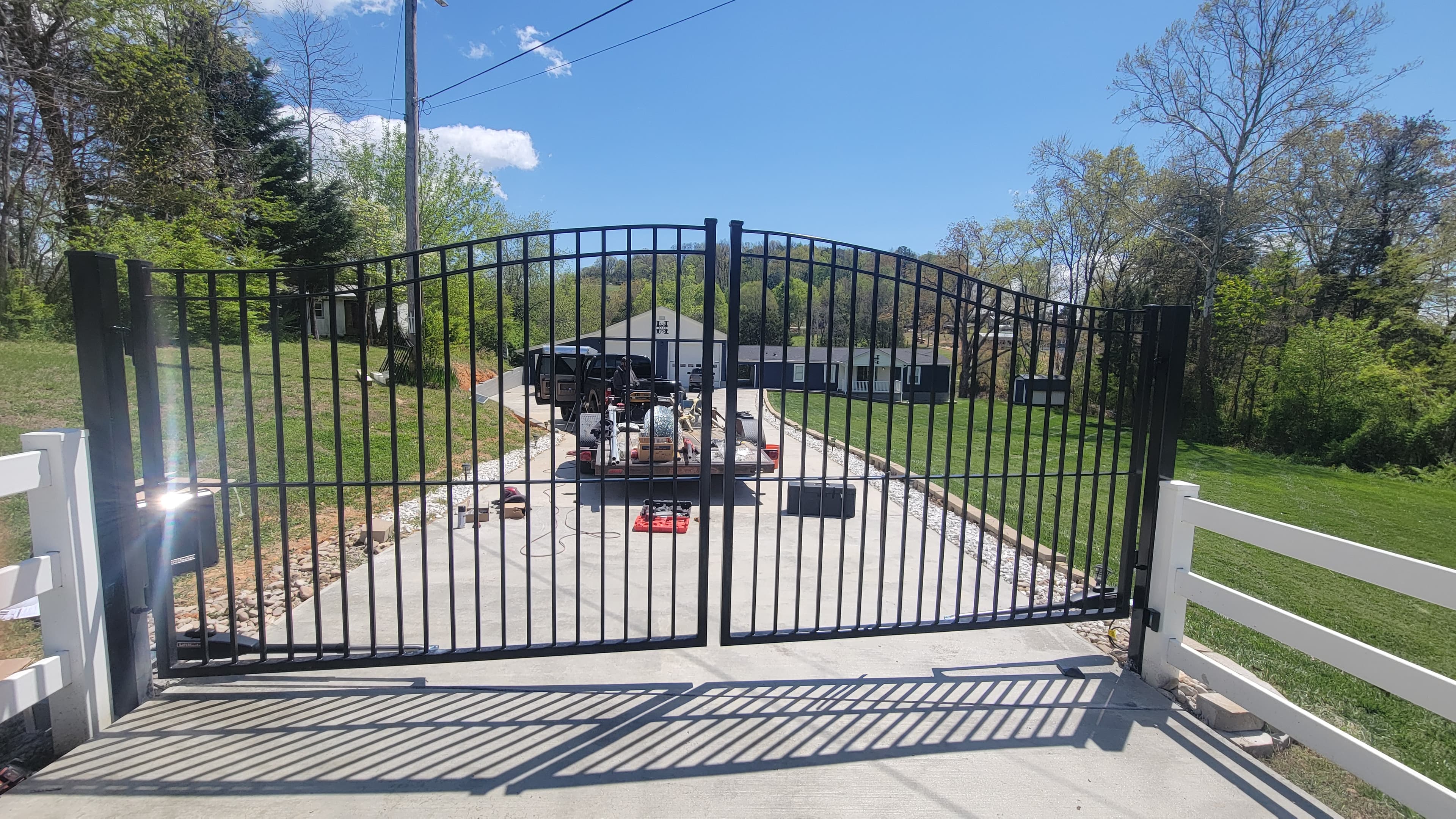 Estate gate with ornamental design and columns
