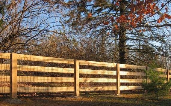 Four flat rail wooden fence with wire mesh for maximum security