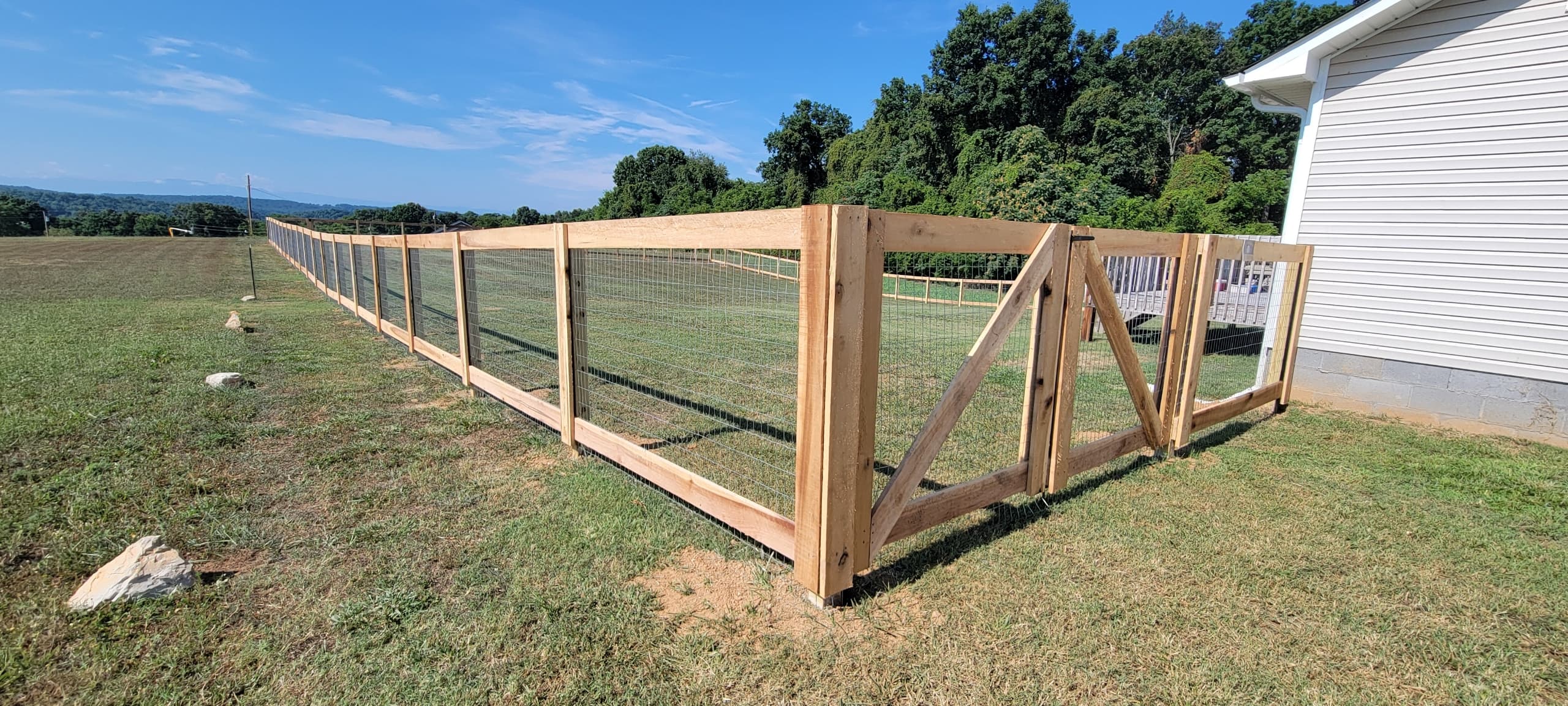 Cedar wood fence with custom staining